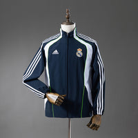 Cortavientos Real Madrid Azul Marino - Blanco Adultos