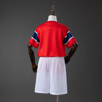 Camiseta + Short Noruega Local 26/27 Niños