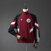 Cortavientos Ajax Carmesí 25/26 Adultos