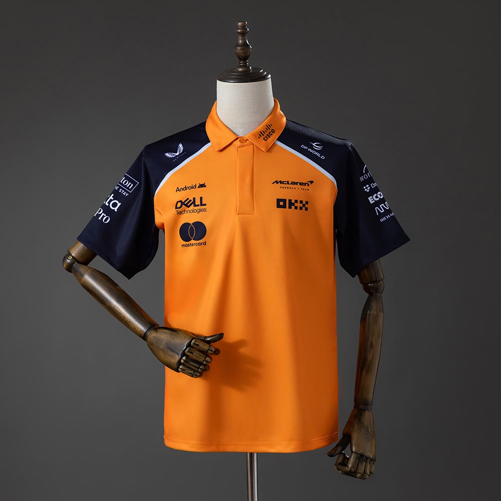 Polo McLaren Racing F1 Naranja y Azul Marino 2025 Adultos
