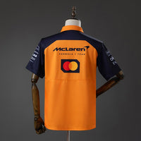Polo McLaren Racing F1 Naranja y Azul Marino 2025 Adultos